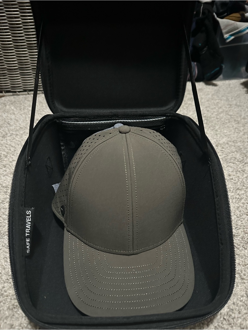 2 Melin A game hats. Green & Silver with traveling hat case.